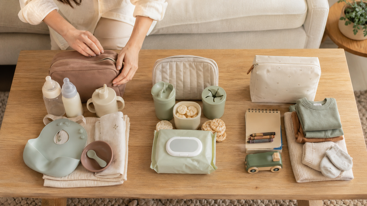 Parent packing an age-appropriate bag for a toddler day out