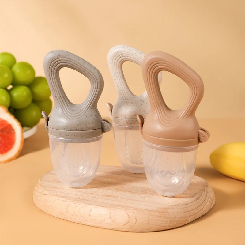 Silicone Infant Teething Fruit Feeder with Rotary Push Mechanism - AmaraKin Nursery & Family Essentials (Photo 1)