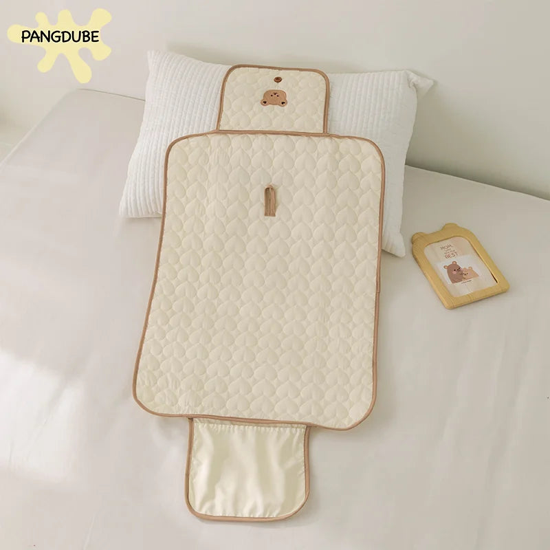 Portable Folding Nappy Changing Clutch with Built-in Head Cushion - AmaraKin Nursery & Family Essentials (Photo 2)