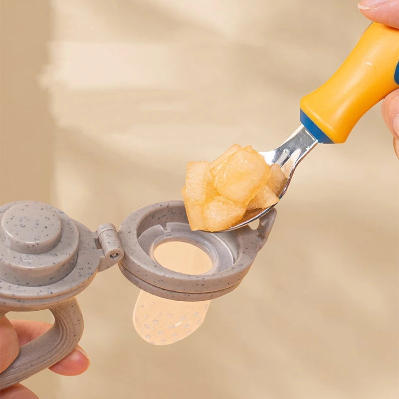 Silicone Infant Teething Fruit Feeder with Rotary Push Mechanism - AmaraKin Nursery & Family Essentials (Photo 4)