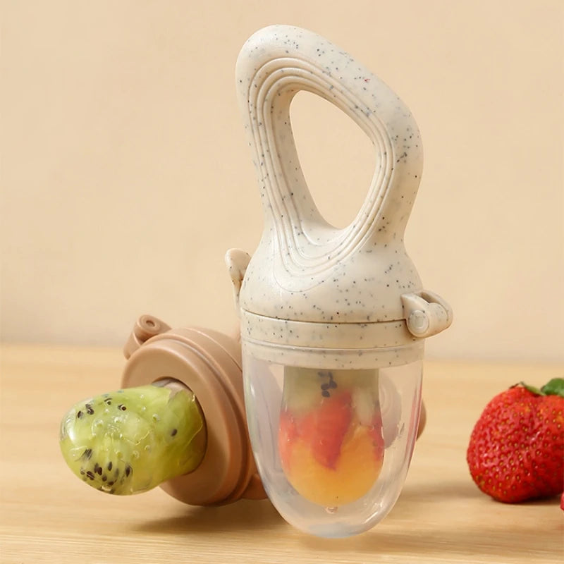 Silicone Infant Teething Fruit Feeder with Rotary Push Mechanism - AmaraKin Nursery & Family Essentials (Photo 3)